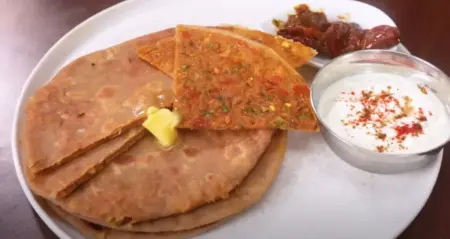 serving the paratha with pickle