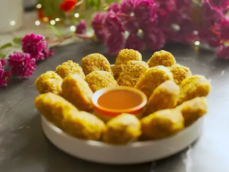 Served Veg Soya Nuggets with dipping sauce