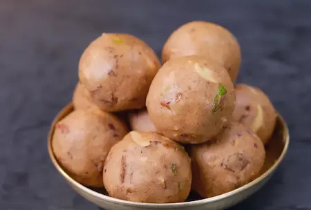 Cooling and storing Pinni Laddus in an airtight container