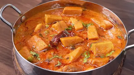 Step 7: adding kasoori methi and coriander to Suran ki Sabji Recipe