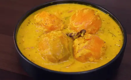 Step 6: Kerala style Mango Curry served hot with steamed rice