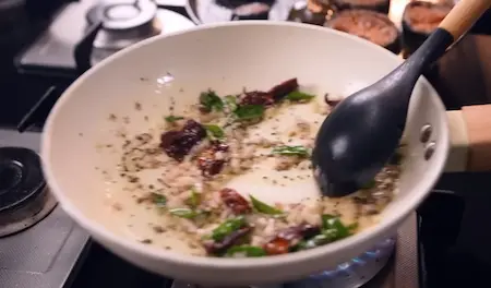 Step 8: Preparing mustard and curry leaf tadka for Smoky Aloo Chokha + Creamy Dahi Baingan