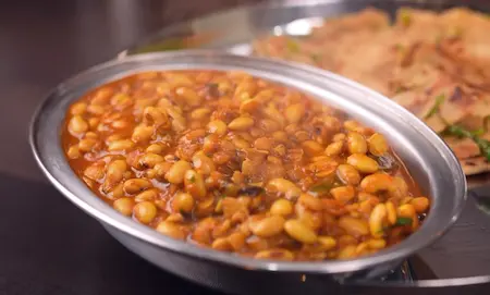 Step 10: Serving hot Soyabean Ki Sabzi with Mirch Laccha Paratha and fresh salad