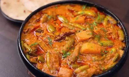 Step 9: Serving hot Masala Tendli Aloo with chapati and phulka