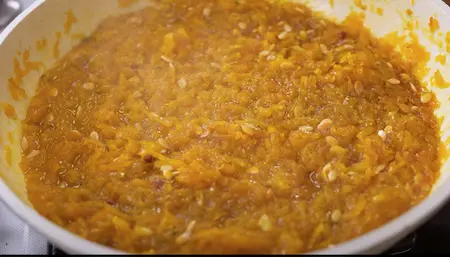 Kaddu Ka Halwa reaching a thick, pudding-like consistency.