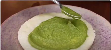 Blending ingredients for green chutney.