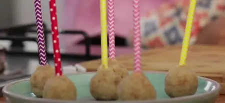 Assembling cake pops with Alpenliebe Juzt Jelly at the center.