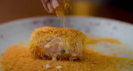 coating the cutlet by mixing flour with water and vermicelli