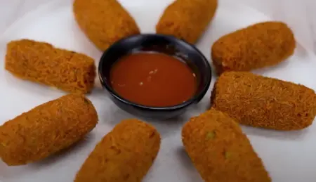 Crispy Poha & Aloo Cutlets served hot with tomato ketchup