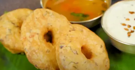 serving the Vada's with rasam and coconut chutney