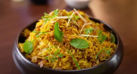 Hot soya biryani served with pomegranate raita, ready to enjoy.