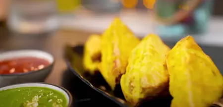 Air fried bread pakodas served hot with chutney.