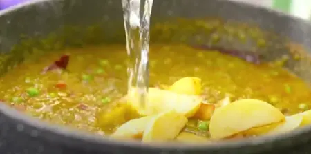 adding fried potato