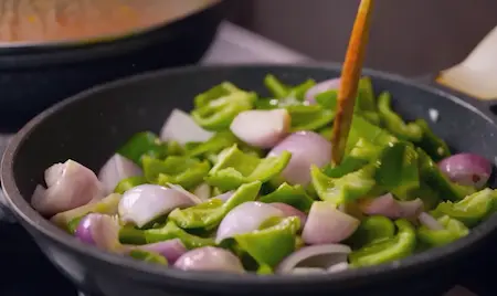 Sautéing vegetables for Malai Pyaaz ki Sabzi