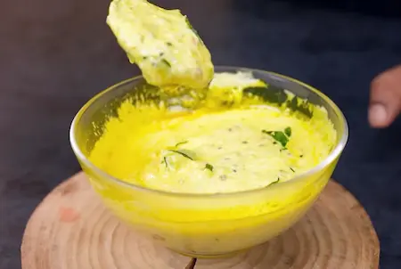 Finishing the ginger pachadi after sautéing