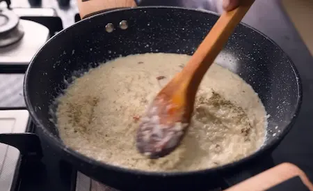 Cooking Jhangore Kheer with nuts and milk