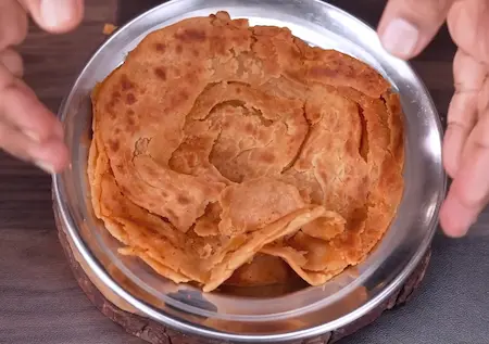 Step 5: stacked mirch parathas kept warm