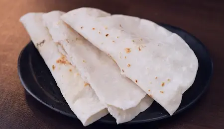 Step 8: preparing rice bhakri for Maharashtrian Fish Thali