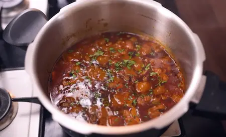 Step 7: Pressure cooking mushroom masala for 1-2 whistles