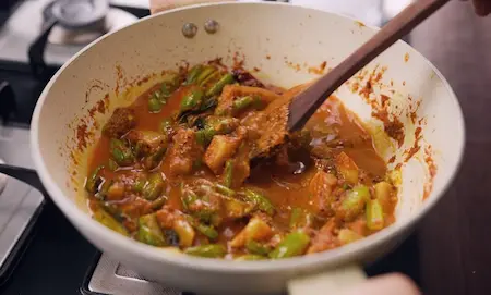 Step 8: Adding fried tendli and potato to masala for Masala Tendli Aloo