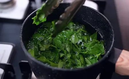Step 1: blanching methi leaves for Winter Saag Sabji