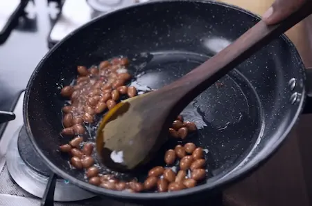 Step 1: Frying peanuts for Mini Singara filling