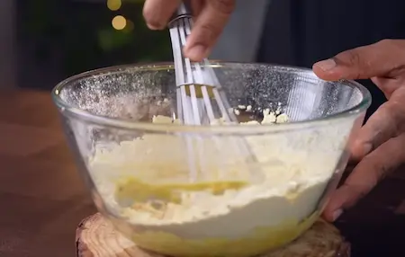 Step 1: mixing besan batter for Soft & Spongy Market Style Khaman Dhokla Recipe