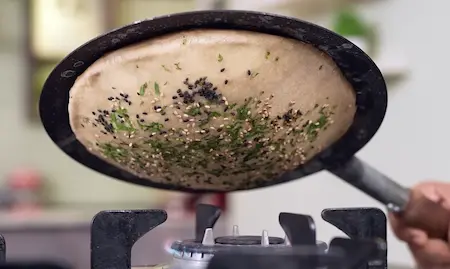 Step 7: cooking kulcha on tawa for Paneer Matar Kulcha