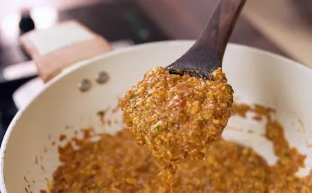 Step 5 adding paneer to Street Style Surti Paneer Ghotala Recipe