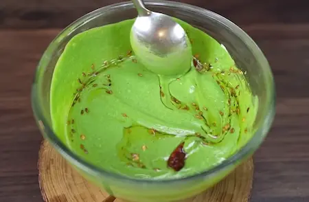 Preparing Bathua Raita for Matar aur Bathua Paratha Recipe