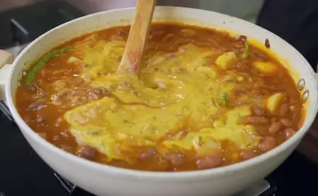 Step 8: Adding curd mixture to Creamy Pahadi-Style Rajma Madra Recipe