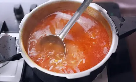 Step 4: Simmering Achari Dal on low flame to bring all flavours together