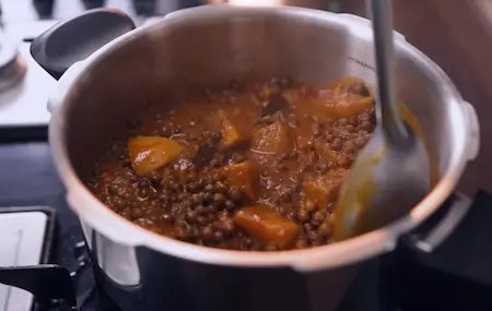 Step 4: Pressure cooking Kala Vatana Usal for 2 to 3 whistles