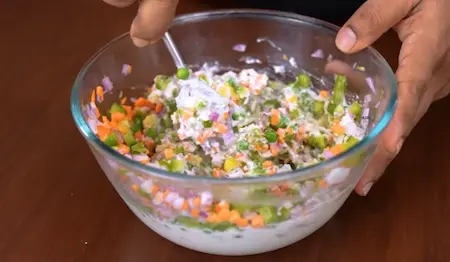 Mixing vegetables into the batter for extra crunch and flavor.