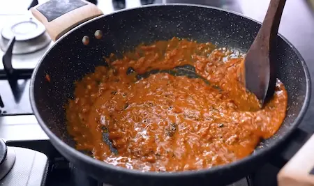 Step 4: adding cashew paste and kasoori methi to make corn masala sabzi gravy