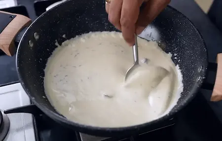 Step 7: Cooking and seasoning white gravy for Paneer Kofta Curry