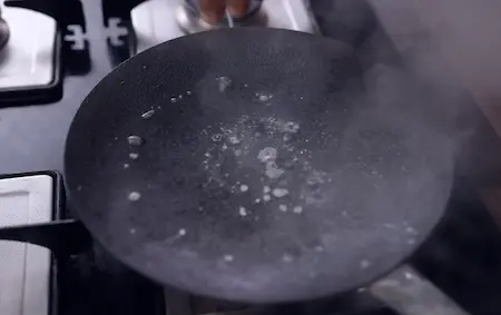 Step 6: heating iron tawa for Paneer Matar Kulcha