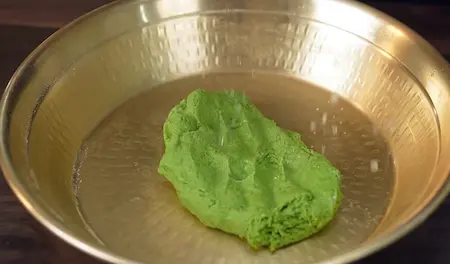 Preparing bathua dough for Matar aur Bathua Paratha Recipe