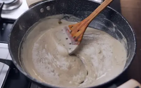 Step 5: Cooking the aromatic malai gravy for Afghani Malai Chicken Seekh