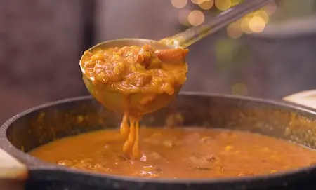 Step 6: Adding boiled chana dal and sautéed soya aloo to build Chana Soya Ki Sabji curry