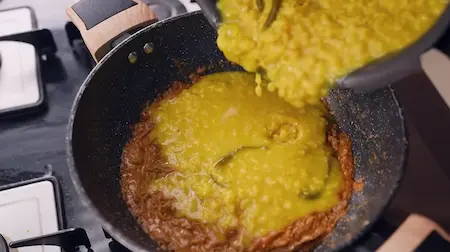 Step 6: Adding boiled toor dal and coconut paste to Burhanpuri Dal masala