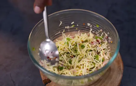 Mixing ingredients for stuffing in a bowl