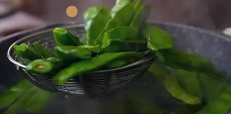 Blanching sem and potatoes in boiling water