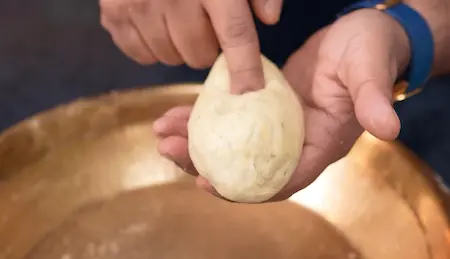 Kneading the dough for Easy Mini Bhakarwadi with maida and besan