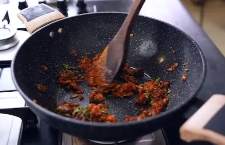Step 3: cooking tomatoes and spices for corn masala sabzi