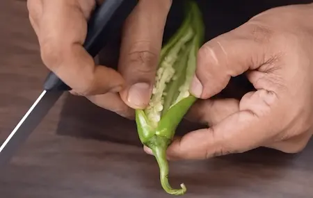 Step 2 preparing bhavnagri chillies for dahi mirchi ki sabji
