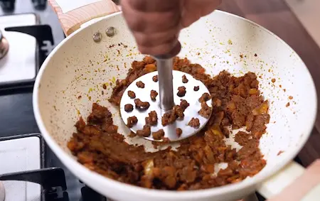Step 3 spicing the masala for Street Style Surti Paneer Ghotala Recipe