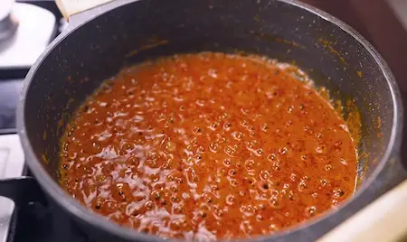 Step 5: Cooking onion, ginger garlic paste and curd masala base for Chana Soya Ki Sabji