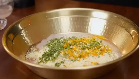 Preparing dough for gatte with spices and besan.