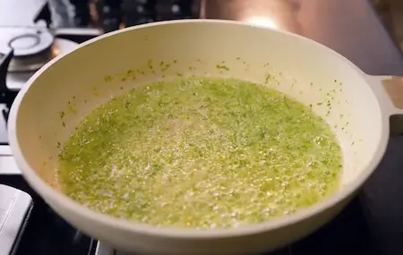 Cooking the masala base in a pan